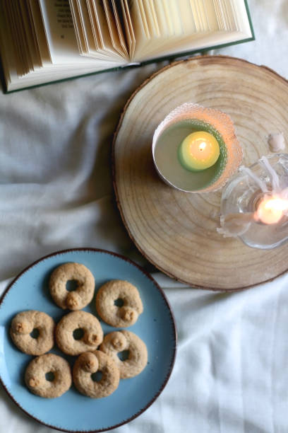 istock Cookies, Book and Candles 1342265860