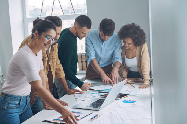 istock Confident business team having quick meeting 1342270582