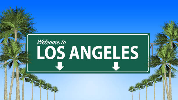 Welcome to Los Angeles freeway sign with palm trees stock photo