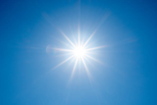 istock Direct ray of the sun in the blue sky 1342274668