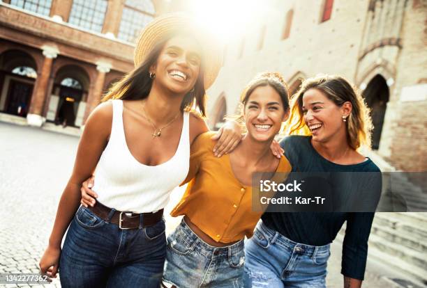 Three Young Diverse Women Having Fun On City Street Outdoors Multicultural Female Friends Enjoying A Holiday Day Out Together Happy Lifestyle Youth And Young Females Concept Stock Photo - Download Image Now
