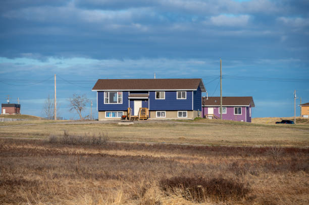 Siksika Nation, Alberta - May 2, 2021: House on the Siksika Nation reservation in Alberta. Housing is a concerning issue for many First Nations people ion the Canadian prairies.
