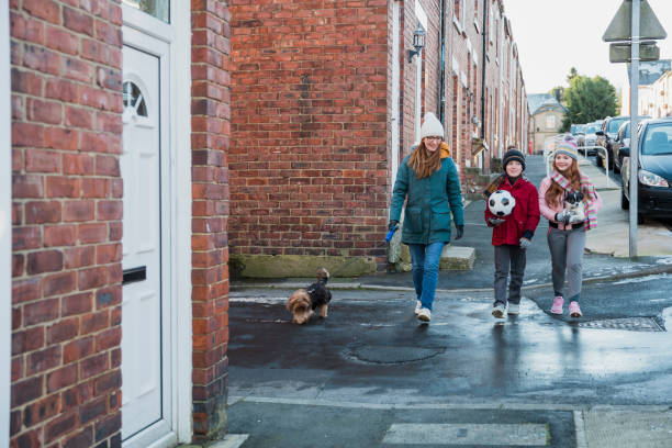 istock Family Dog Walk 1342286327