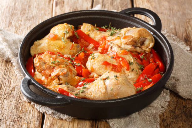 istock Basque Chicken or Poulet Basquaise with vegetables close up in the pan. Horizontal 1342291170