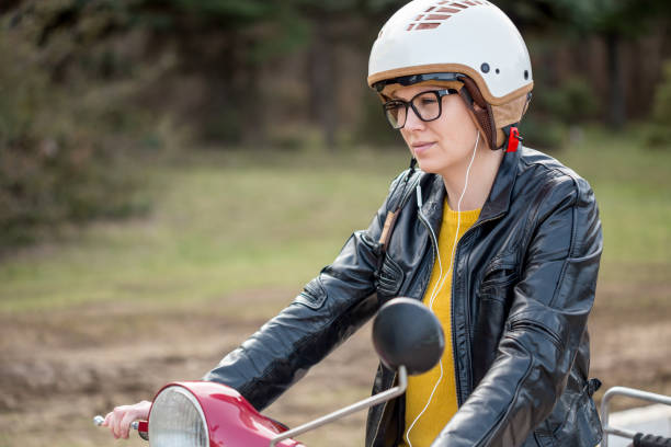 istock Urban girl on scooter 1342299225