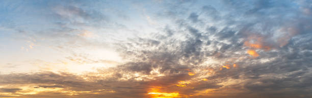 istock Beautiful sunrise or sunset sky with clouds. 1342303353