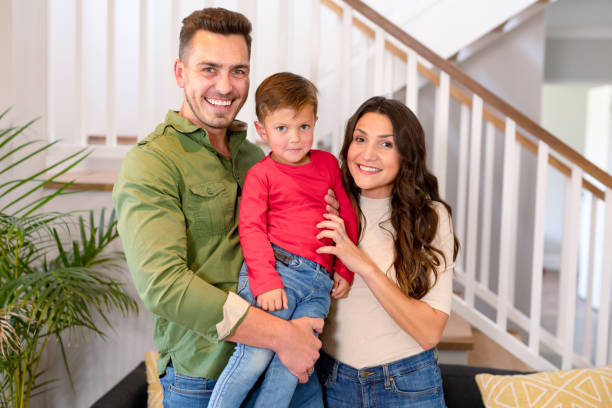 istock Happy caucasian parents and son looking at camera 1342307122
