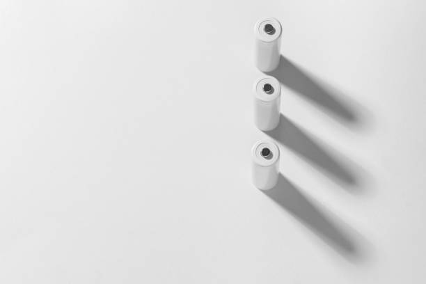istock AA size alkaline batteries on a white background. Several batteries in a row. Space for text. 1342311954