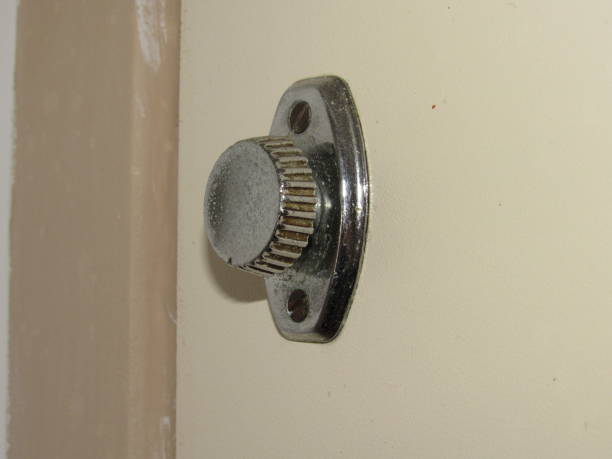 istock Rotary latch on a beige door 1342314382