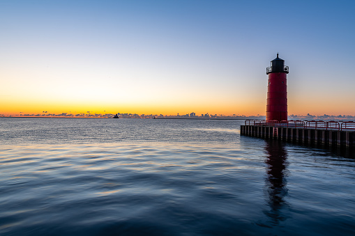 The Milwaukee Harbor and lighthouse at sunrise