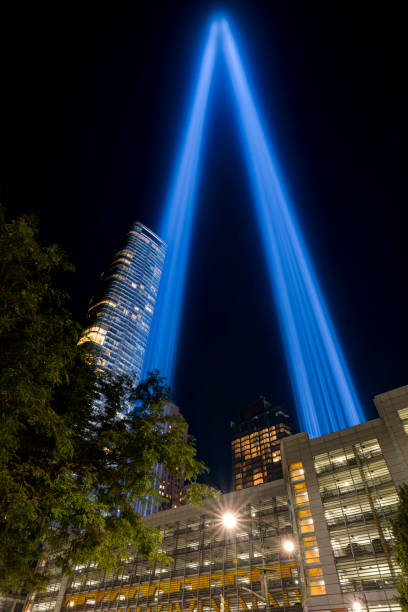 istock 9/11 Tribute in Light. Lower Manhattan illuminated at night. Battery Parking Garage. View from West Street. 1342319668