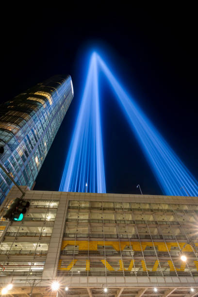 9/11 Tribute in Light. Lower Manhattan illuminated at night. Battery Parking Garage. View from West Street. 9/11 Tribute in Light. Lower Manhattan illuminated at night. Battery Parking Garage. View from West Street. to the struggle against world terrorism statue photos stock pictures, royalty-free photos & images