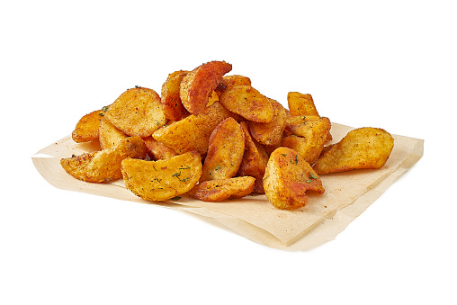 Heap of fried potatoes isolated on white background. Clipping path included