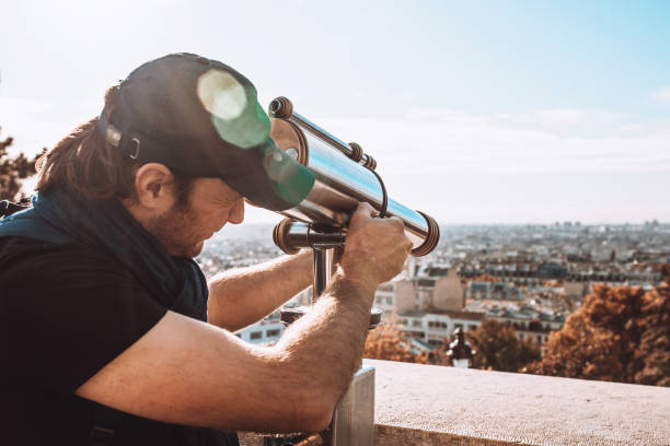 istock A man looks into the observation tube from the observation deck 1342322005