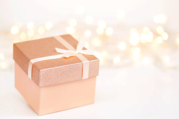 istock Gift box and blurry lights on the background 1342322029