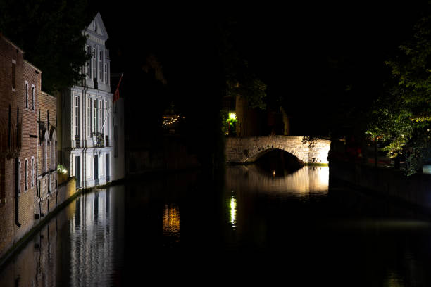 istock A canal and bridge in Bruges at night 1342323368