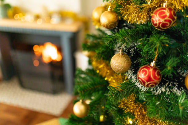 istock Baubles, chains and other decorations hanging on christmas tree 1342326307