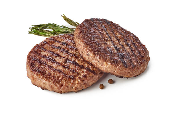 grilled beef patties on white background - burger imagens e fotografias de stock