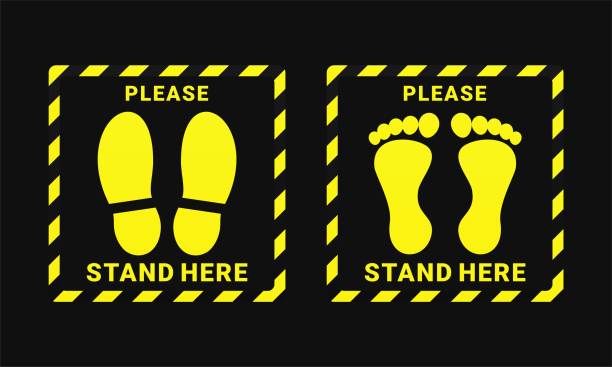 istock Stand here sign. Wait here. Keep distance. Footprint floor. Social distance. 1342330142