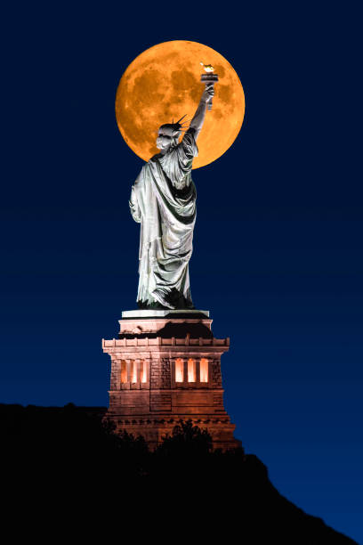 istock Statue of Liberty with Full Moon 1342330874