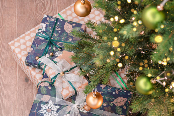 istock Top view at Christmas presents under the Christmas tree 1342330934