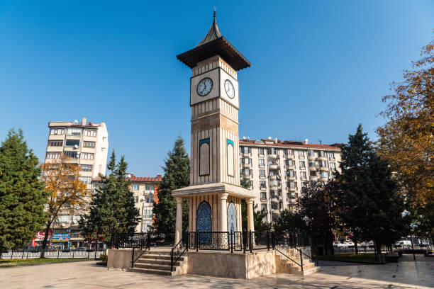 Kutahya, Turkey - November 17, 2020. Tiled clock tower (Saat kulesi) in Azerbaijan park in downtown Kutahya. The building dates from 2006 and was built on the site of a church that was demolished in 1970.