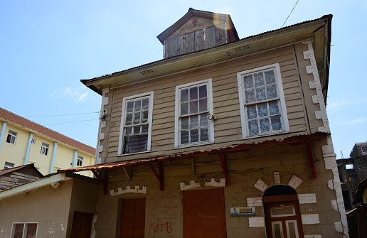 Freetown, Sierra Leone: façade of an old wooden colonial building on Waterloo Street.