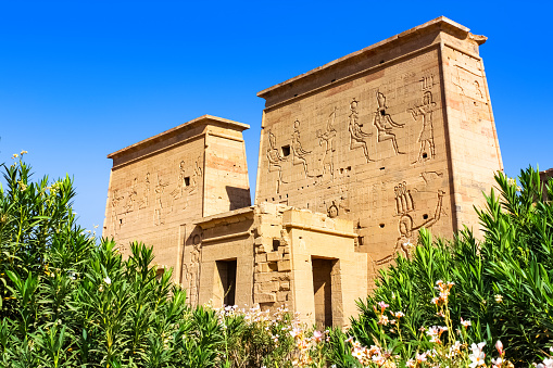 Entrance of the Philae Temple of Isis in Agilkia Island, Egypt on a sunny day.