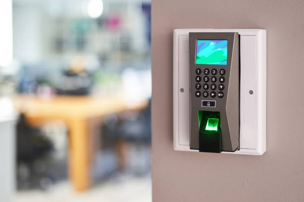 istock Facial recognition and fingerprints scanner machine for access door security. 1342346498