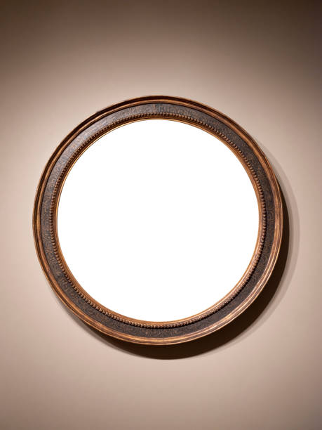 istock Vintage Round shape wooden frame hanging on wall with empty space 1342350018
