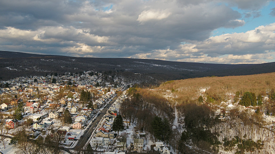 Aerial drone view of Jim Thorpe, Poconos, Pennsylvania, USA, in the snowy winter after a snowfall.