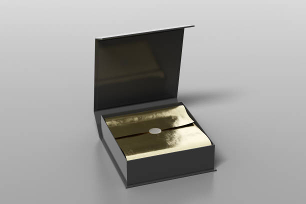 istock Black opened square folding gift box mock up with gold wrapping paper on gray background. Side view. 1342354011