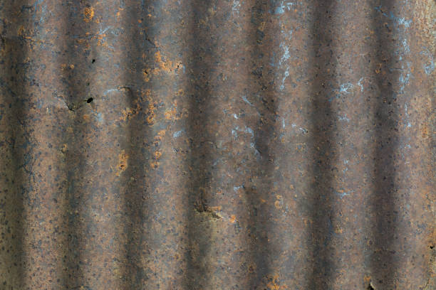 istock aged and rusty corrugated metal roofing sheet background texture 1342364055