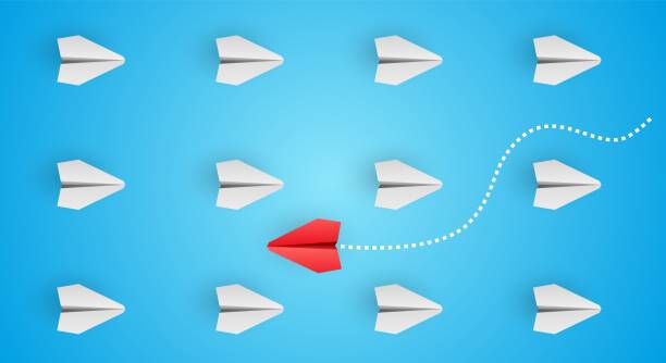 istock Think different - individuality concept. Individual and unique leader red paper plane flies to the side. Vector 1342370372