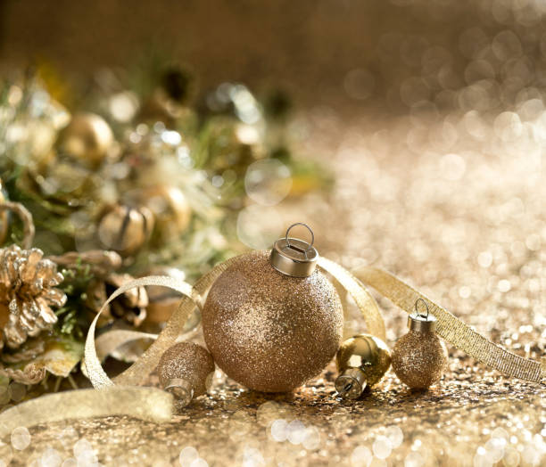 istock Christmas Gold Baubles Background 1342374936
