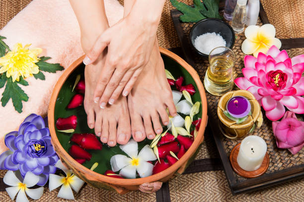 Spa treatment and product for female feet . Thai Spa Treatments aroma therapy salt . Thailand. Healthy Concept. Spa treatment and product for female feet . Thai Spa Treatments aroma therapy salt . Thailand. Healthy Concept. foot spa treatment stock pictures, royalty-free photos & images