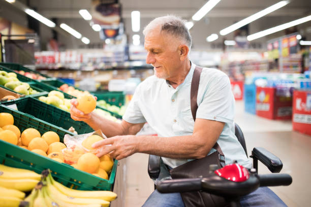 istock Senior man with a disability in shopping 1342392530