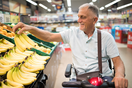 Senior man shopping in the supermarket