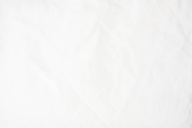 istock abstract blurred crumpled white paper background, horizontal 1342393856