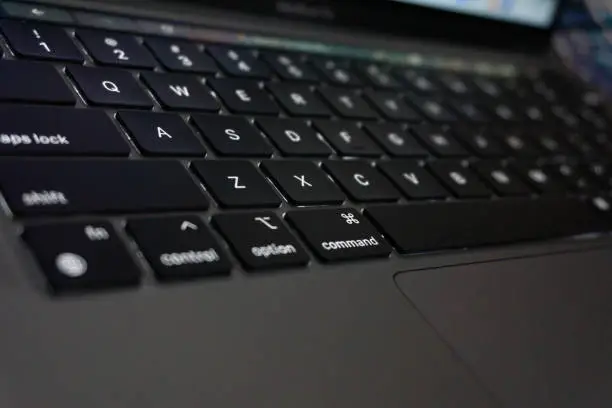 Photo of Macbook Pro M1 keyboard Low angle closeup