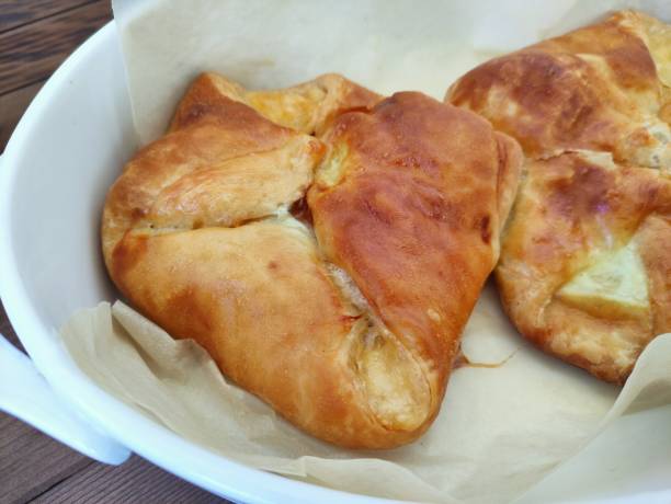 istock Baked puff pastry buns with cheese khachapuri 1342398574