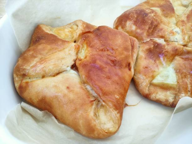 istock Baked puff pastry buns with cheese khachapuri 1342398581