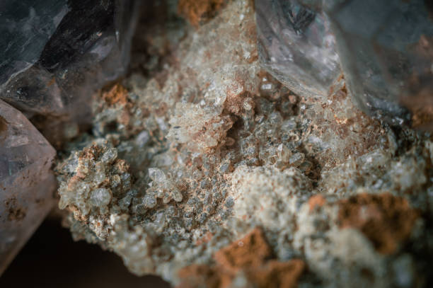 istock A sample of rock with amethyst under great magnification. Mountain mineral with crystals. Macro, horizontal composition 1342399422