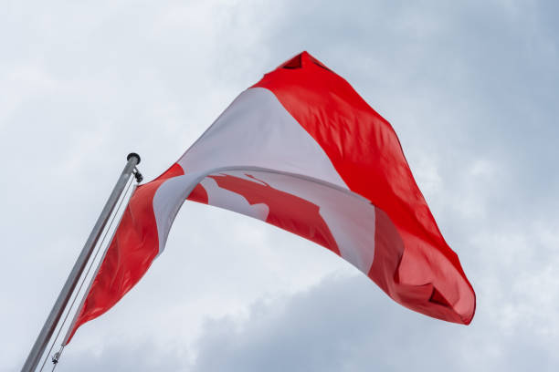 istock Canadian flag waving in the wind 1342401553