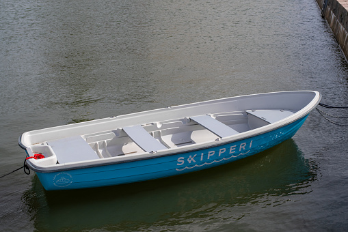 Helsinki, Finland - August 20 2021: Skipperi boat for rent in Helsinki city center. Skipperi is a Finland-based fast-growing boating startup with a mission to make boating simple.
