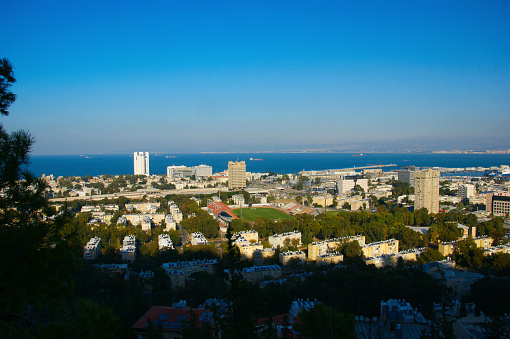 Haifa, Israel - January 16, 2013: The streets of Haifa. Houses and streets of a large port city on the shores of the Mediterranean Sea. View of Haifa from Mount Carmel