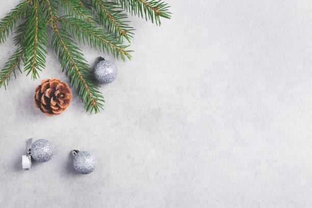 istock Christmas background with winter decorations on grey. 1342413135