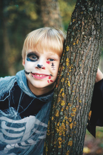 istock A boy in a skeleton costume for Halloween 1342413188