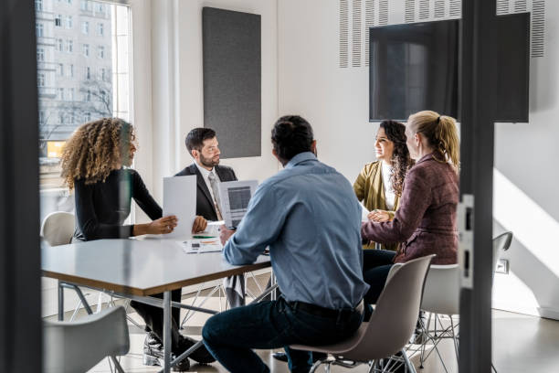 istock Business team discussing start-up project and budget constrains 1342418028