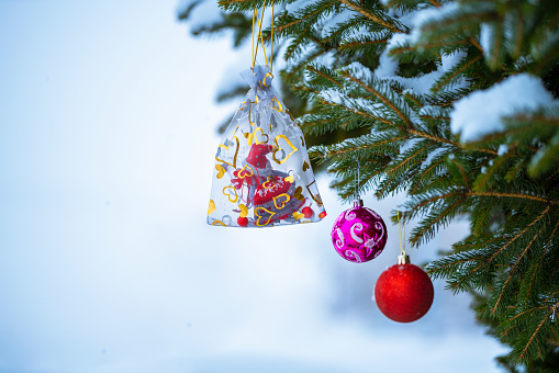 Real Christmas ornaments background with snow.